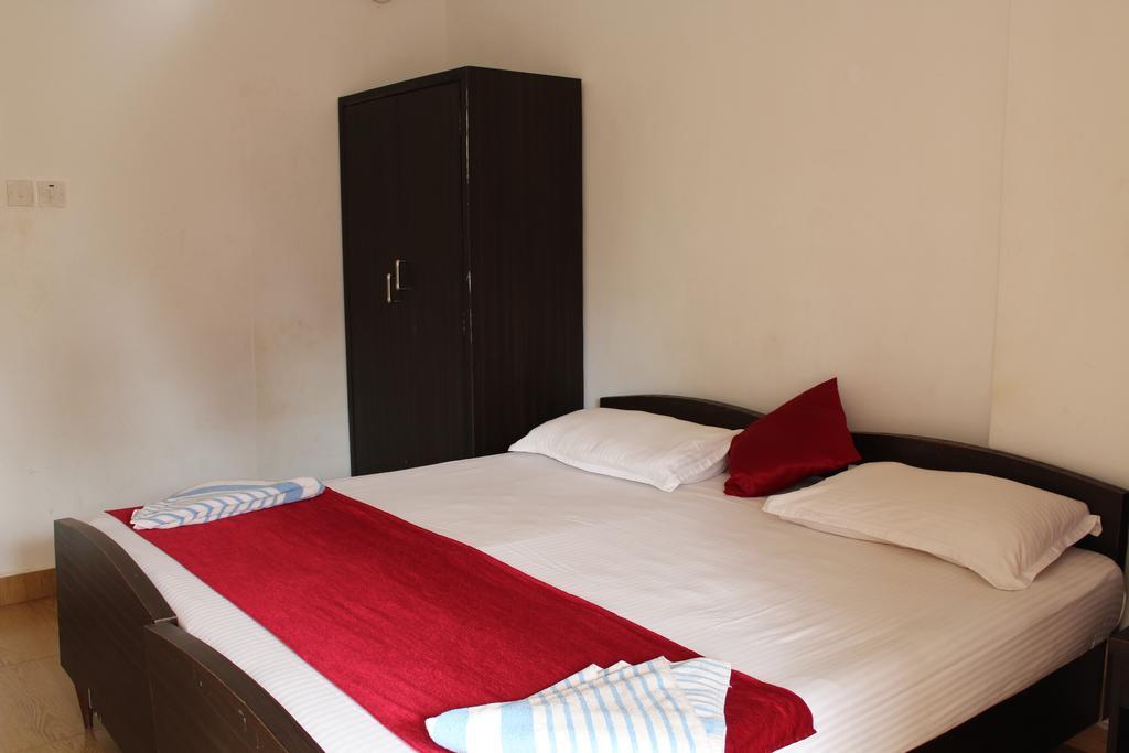 Sugar Plum Macedo Palms Bed & Breakfast Baga Bilik gambar