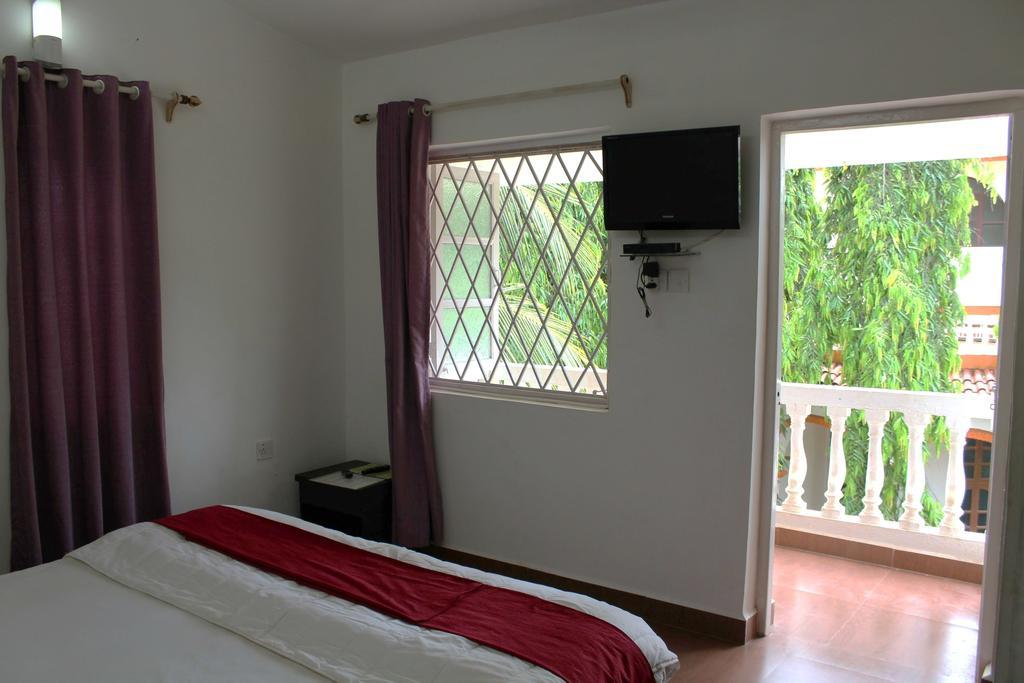 Sugar Plum Macedo Palms Bed & Breakfast Baga Bilik gambar