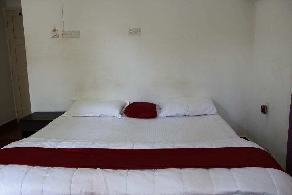 Sugar Plum Macedo Palms Bed & Breakfast Baga Bilik gambar